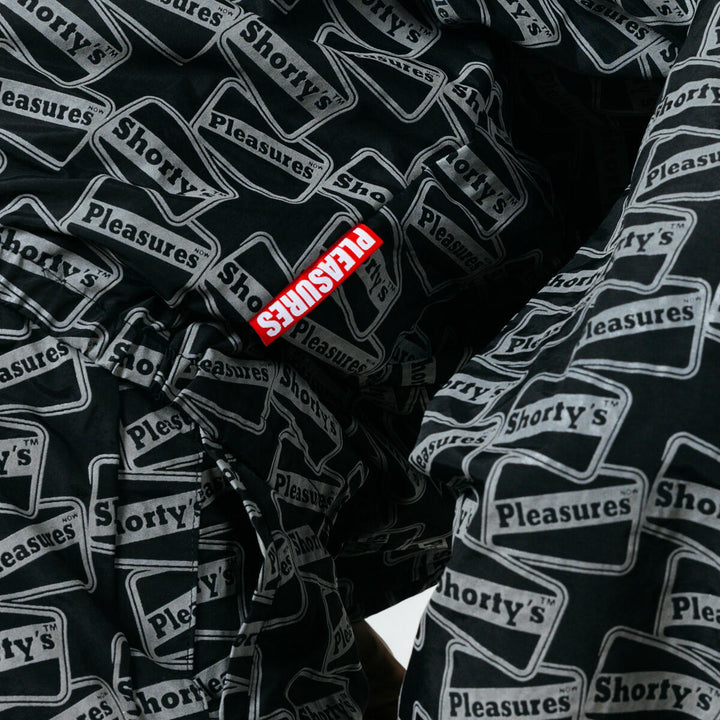 PLEASURES REFLECTIVE TRACK JACKET - BLACK